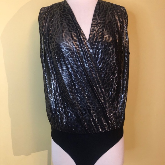 unbranded Tops - Bodysuit 💐sparkle and built in tank. NWOT. Snap closure